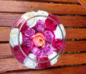 floral arrangement of roses floating in water
