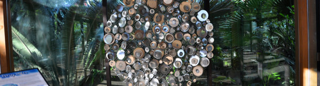 sculpture made of reflective circles that shines in the light