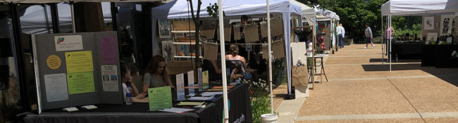 Event Garden Art Fair outdoors with different booths of artists selling their wares