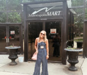 intern smiling outside of the Minneapolis gift shop mart