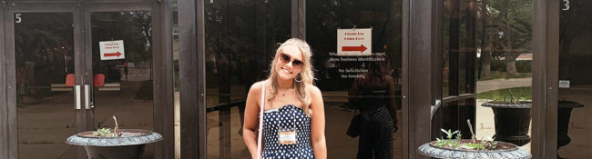 intern smiling outside of the Minneapolis gift shop mart